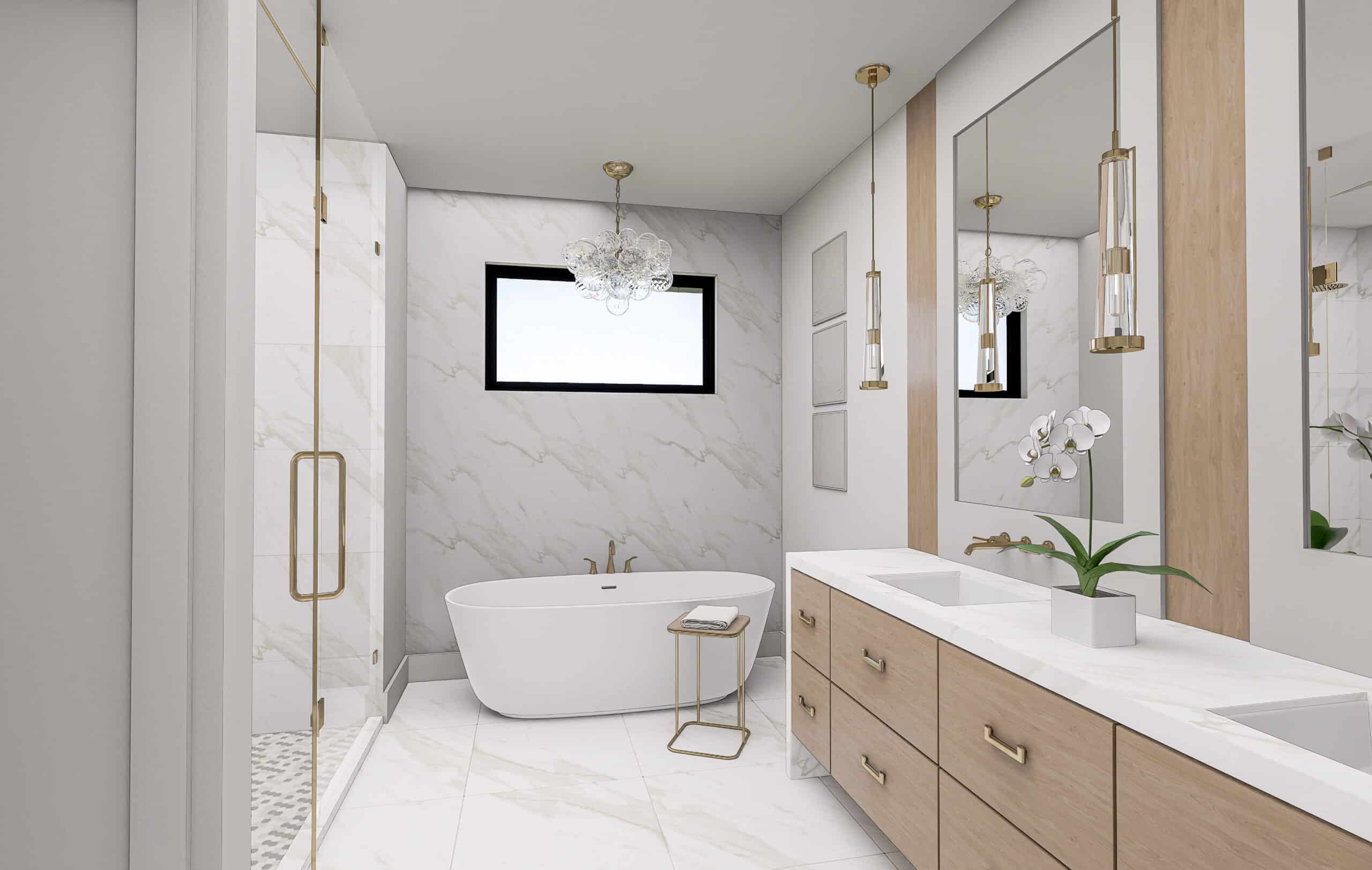 Primary bathroom with a freestanding tub and brass fixtures
