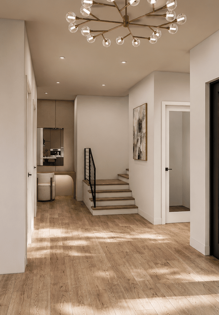 Entry hall with an arched opening and a branching chandelier