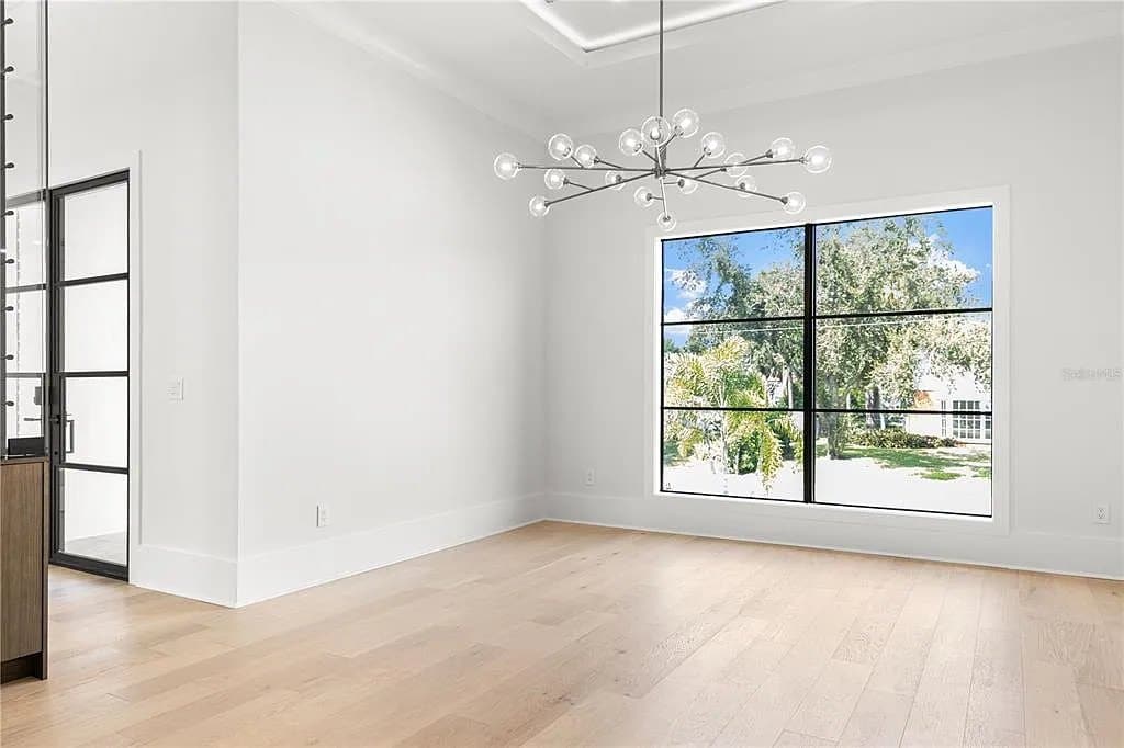 Room with floor-to-ceiling glass bringing daylight into a wellness-focused home